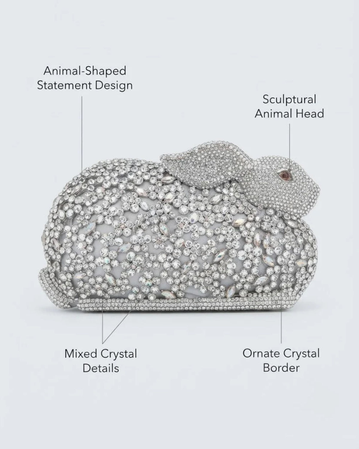 Silver crystal rabbit-shaped statement clutch with sculpted animal head and crystal border