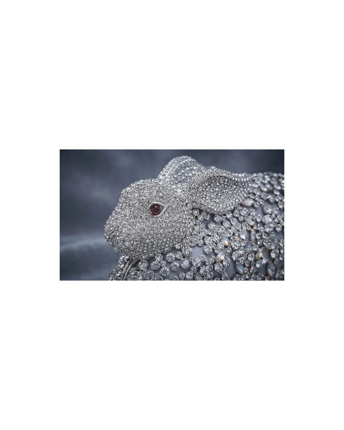 Silver crystal rabbit-shaped clutch with rhinestone embellished face and body