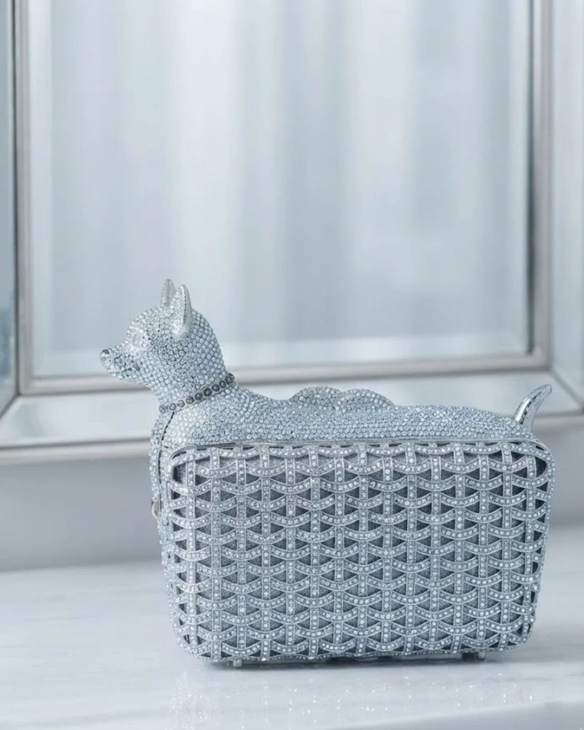 Silver rhinestone dog-shaped clutch with crystal lattice and pointed ear