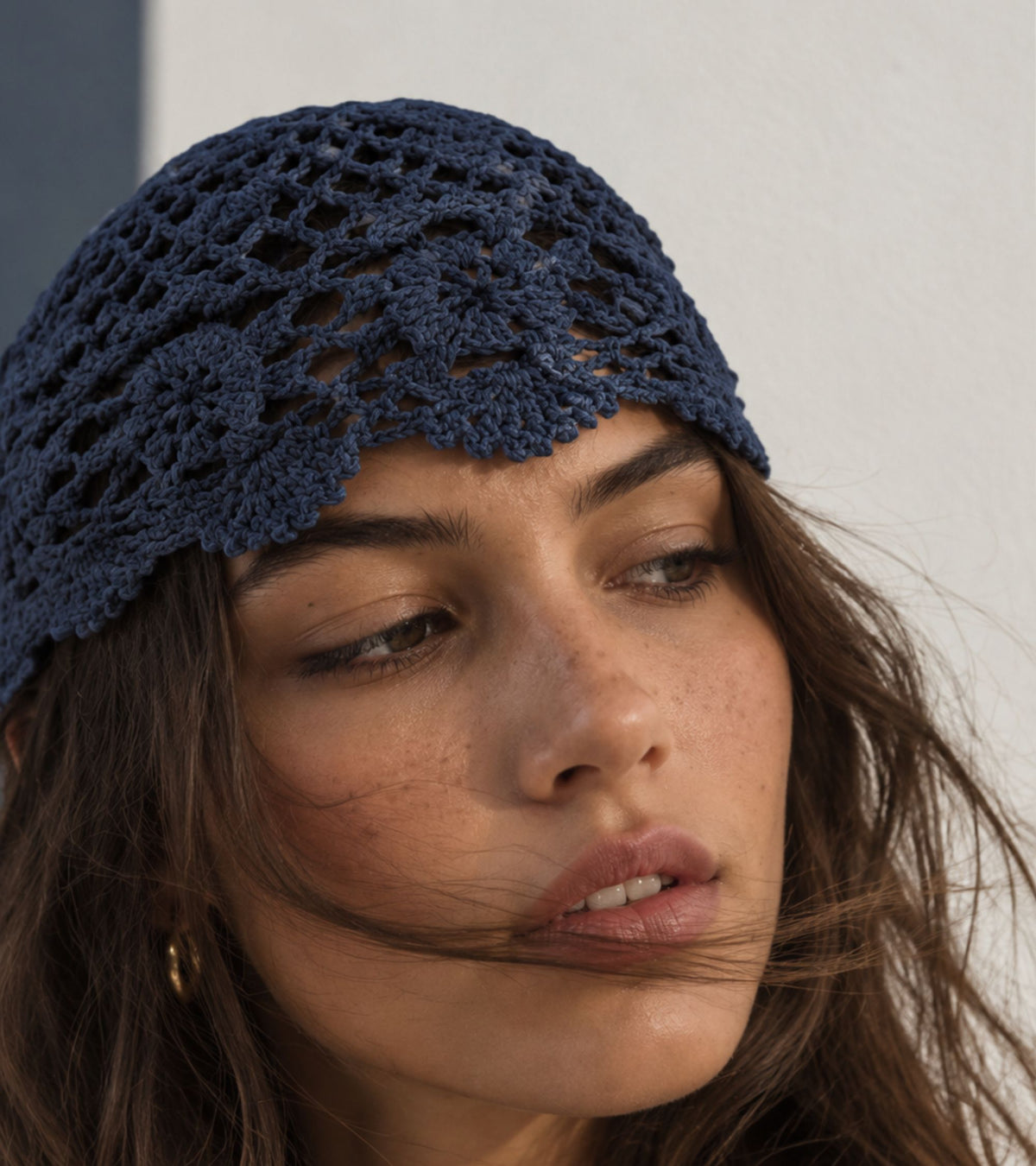 Navy crochet beanie hat with detailed lace openwork texture