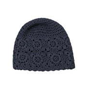 Navy crochet beanie hat with lace flower motifs and textured knit brim