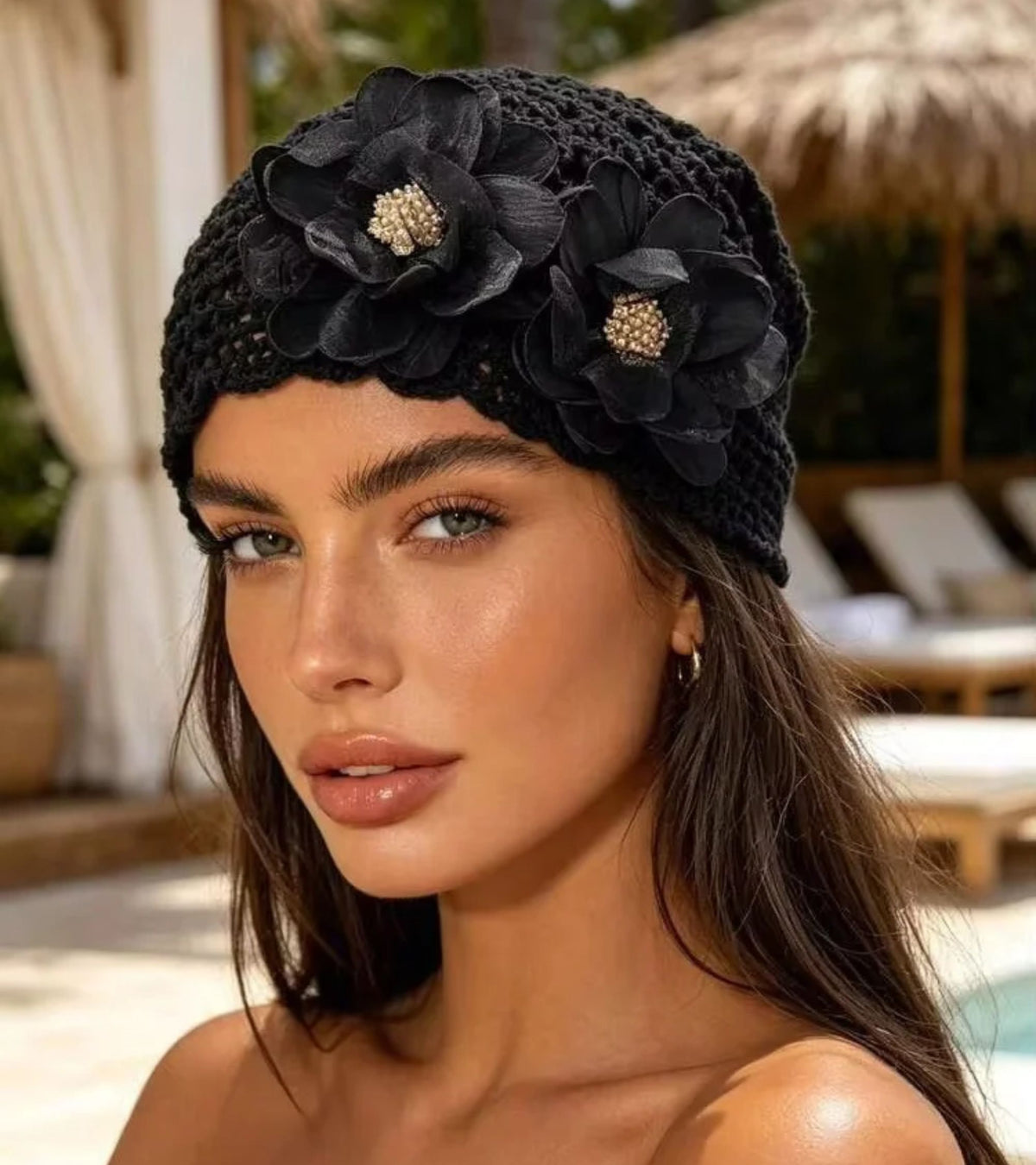 Black crocheted beanie with layered organza flowers and pearl center embellishments