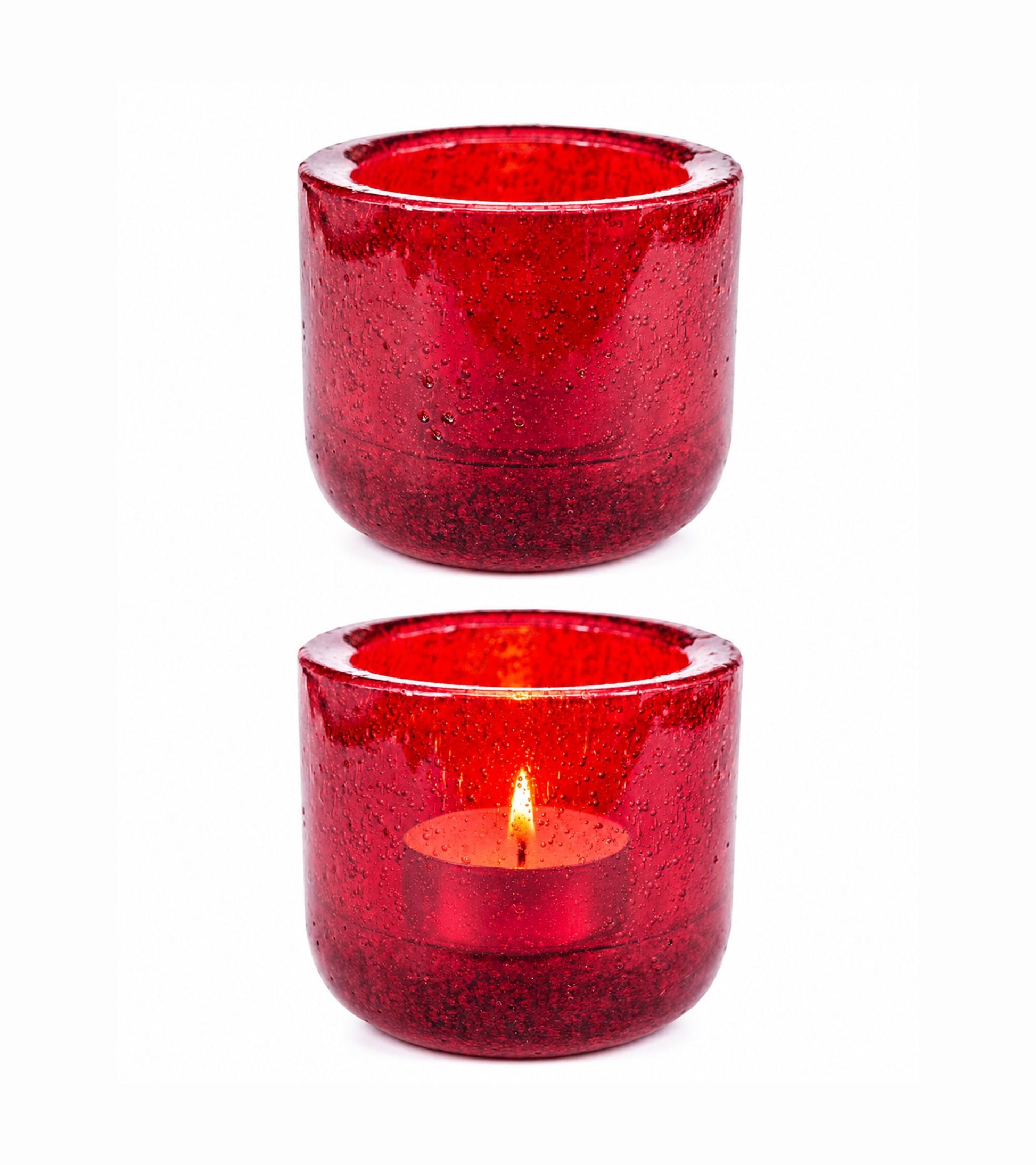 Red glass votive candle holder with flickering tealight inside, cylindrical shape