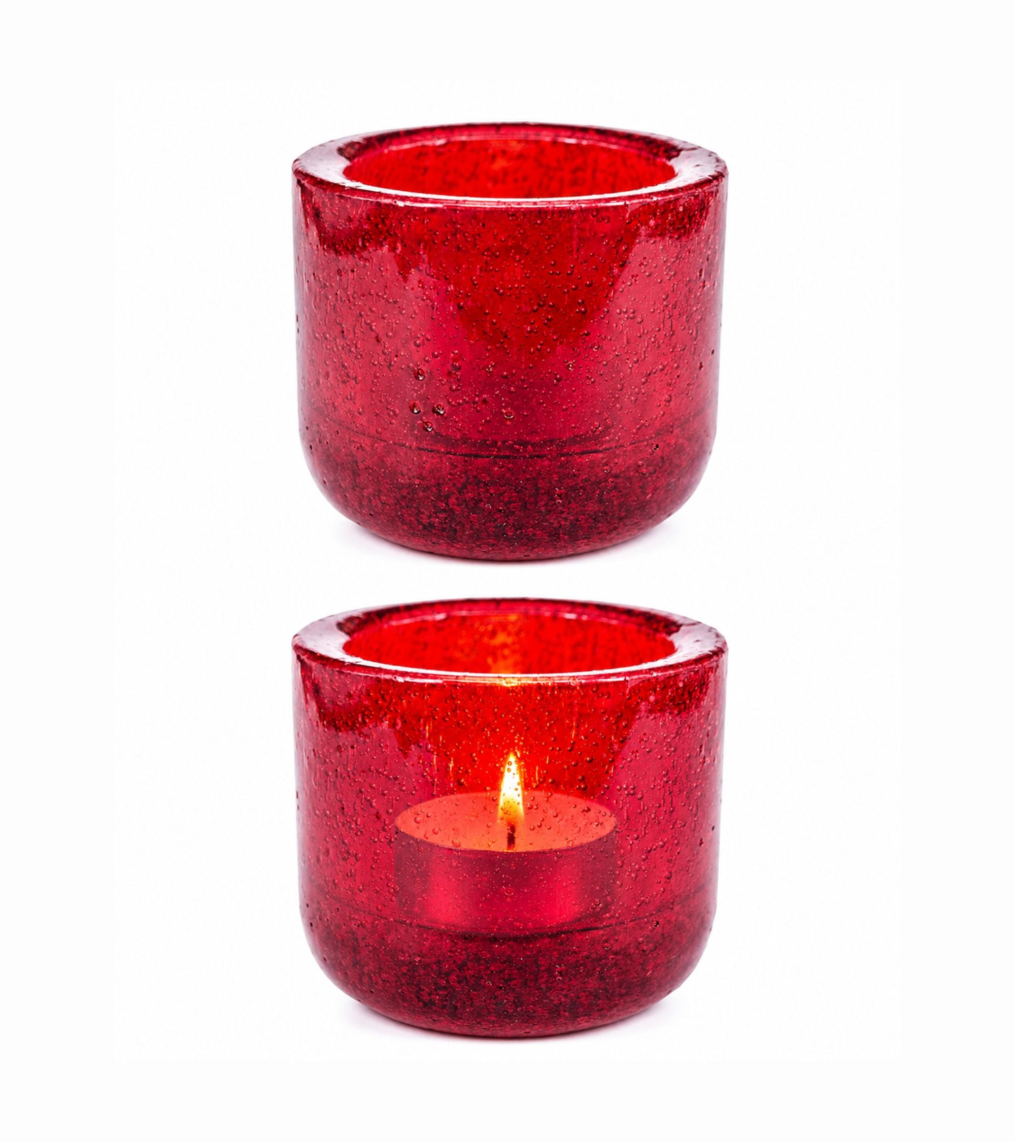Red glass votive candle holder with flickering tealight inside, cylindrical shape