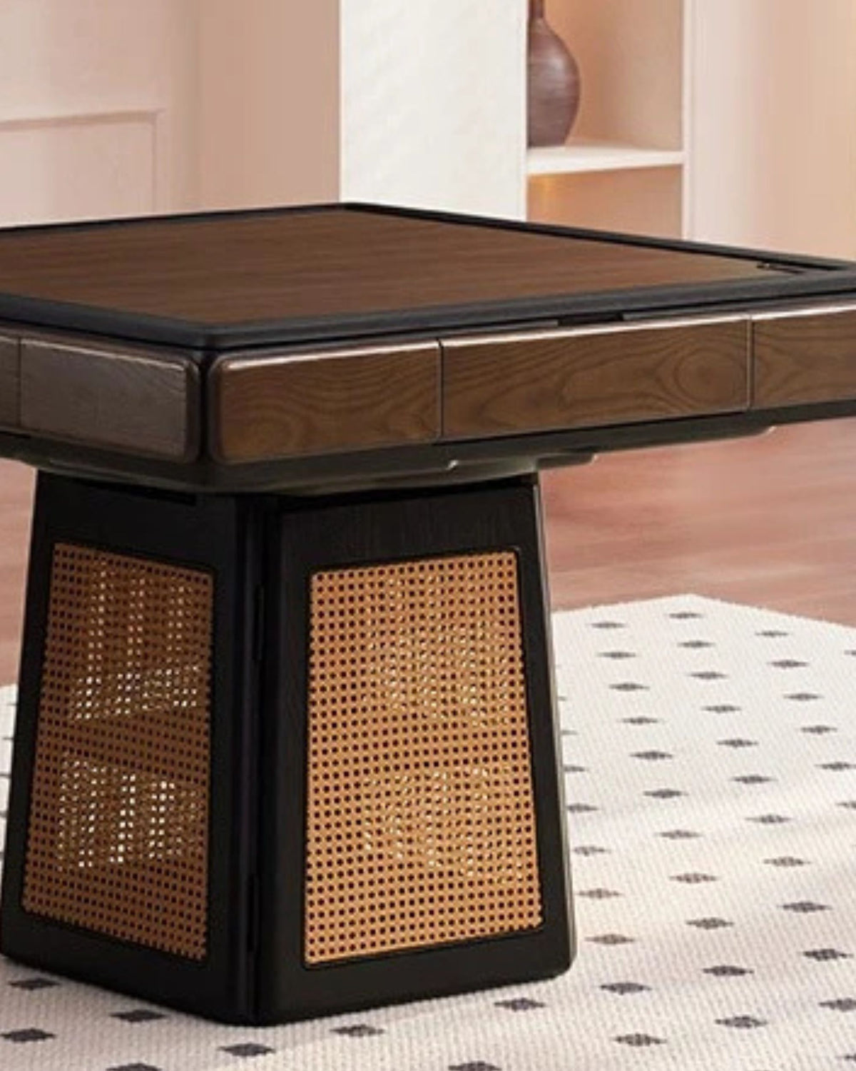 Mahjong table corner with dark tabletop and two woven wicker side panels
