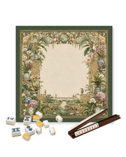 Square mahjong table mat with ornate garden trellis border; mahjong tiles on top.
