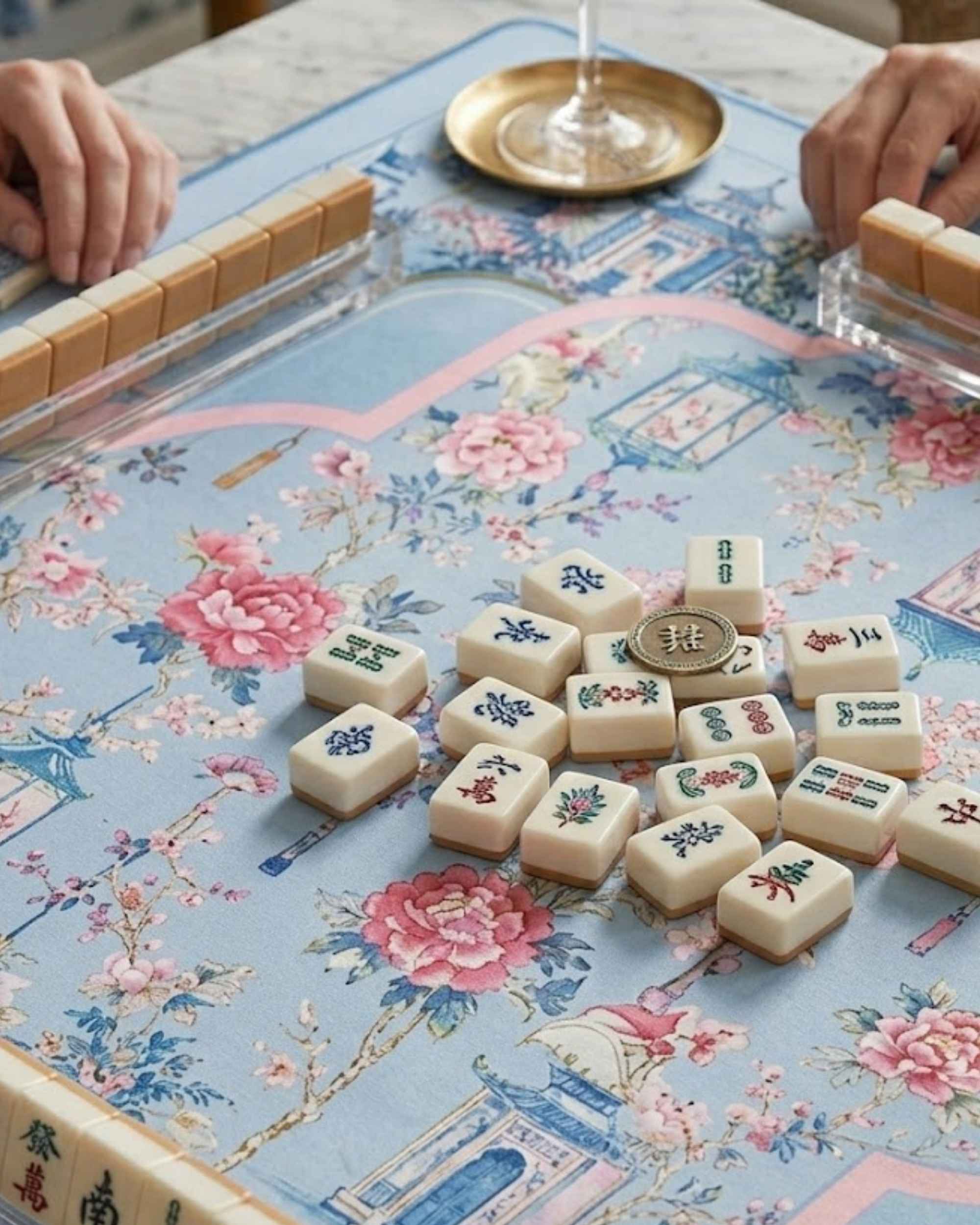 Square mat with light blue base, pink floral motifs, and printed decorative frame
