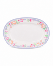 Oval melamine serving plate with pastel floral border around the rim