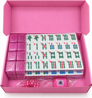 Pink glitter mahjong tile set with 152 tiles in open storage box
