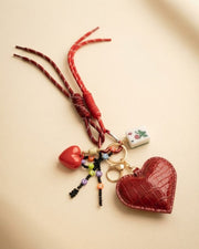 Premsons® mahjong keychain with red heart charm, tassel cord, and small tile pendant