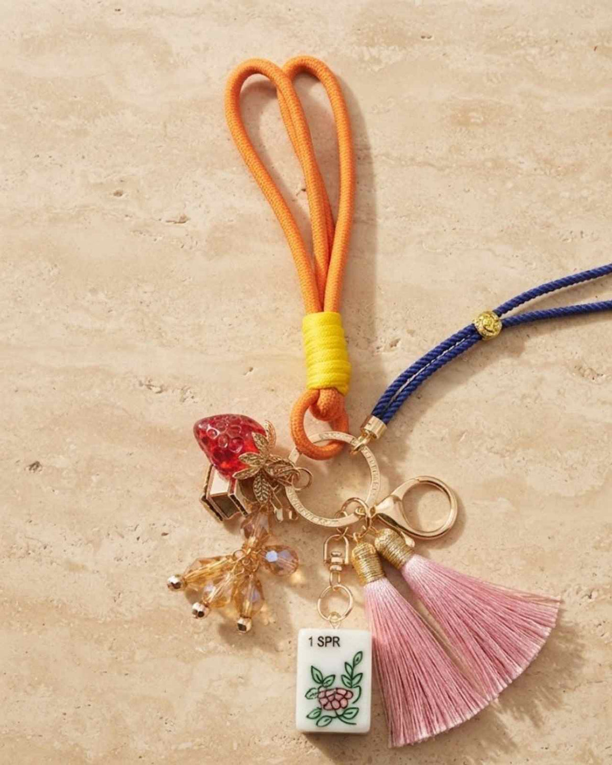 Premsons® mahjong keychain: orange loop, red tile charm, pink tassel, blue beaded cord