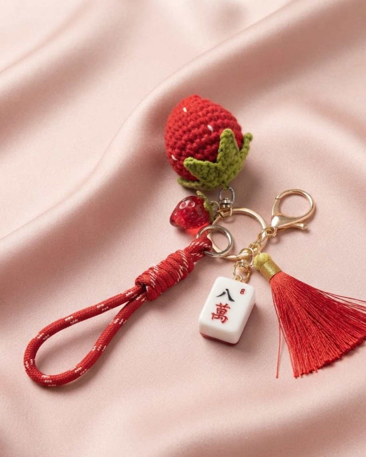Red strawberry mahjong keychain with tassel and small tile charm