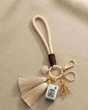 Premsons mahjong keychain with shell tile charm, light pink tassel and gold rings
