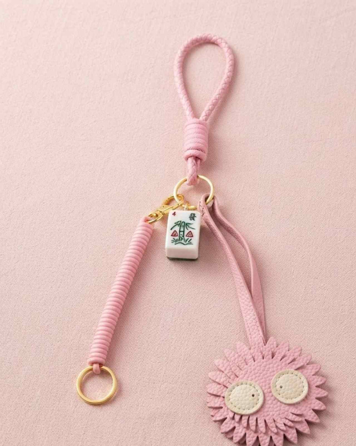 Pink mahjong keychain with cord, square charm, and pink flower dangle
