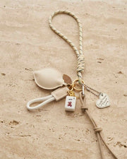Natural tassel mahjong keychain with beaded cord, small tile and metal charms