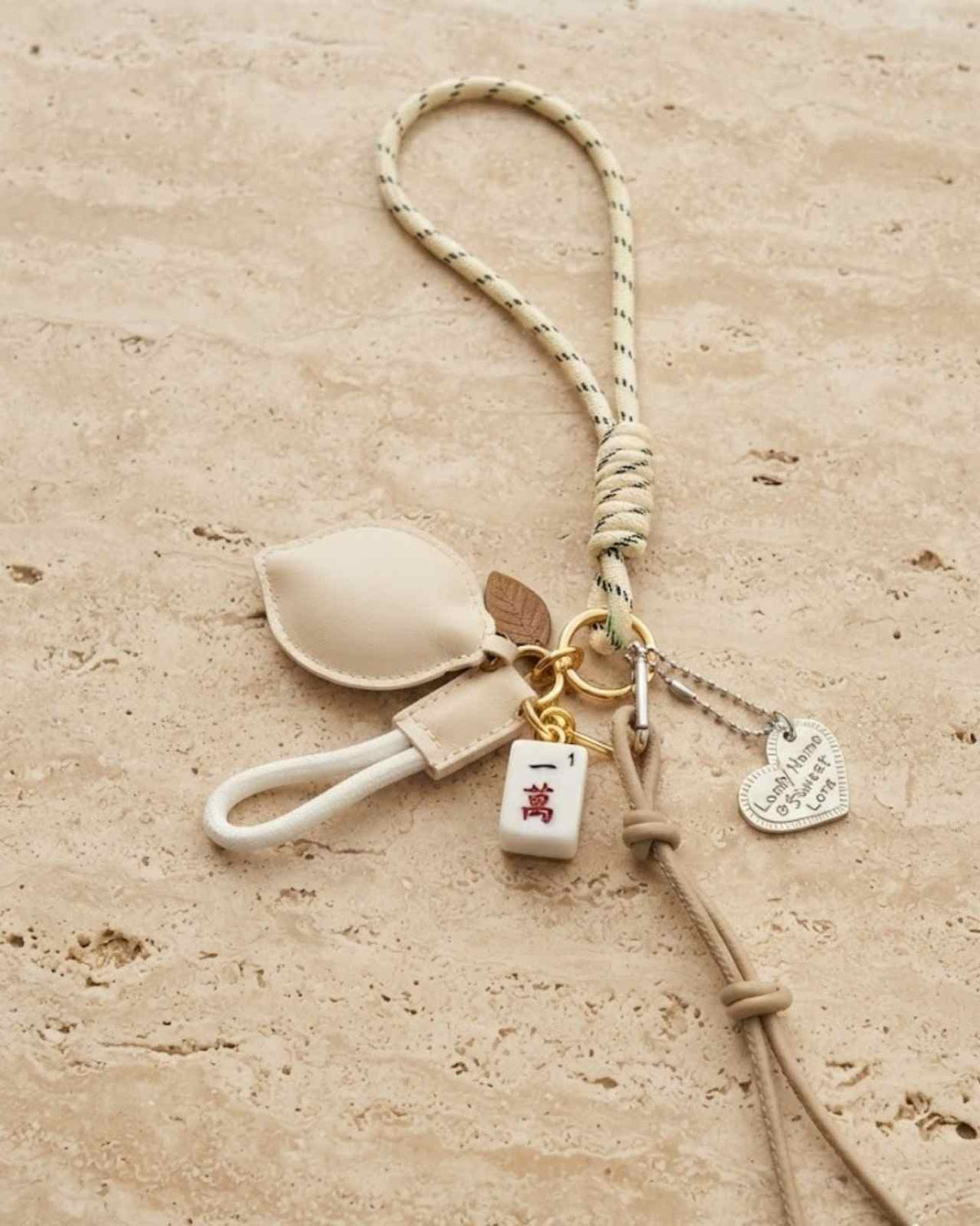 Natural tassel mahjong keychain with beaded cord, small tile and metal charms