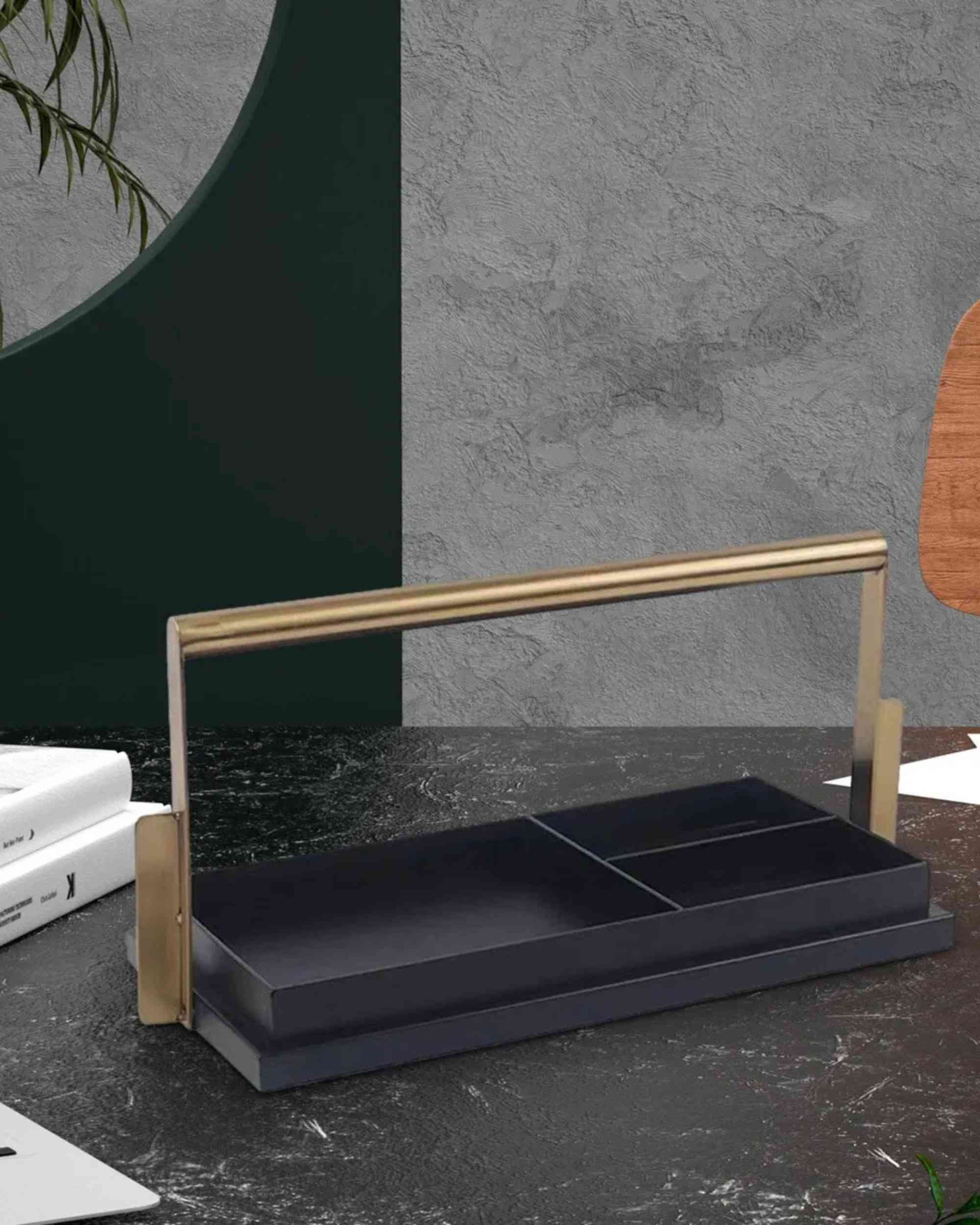 Black desk organizer tray with two divided compartments and gold-tone handle frame