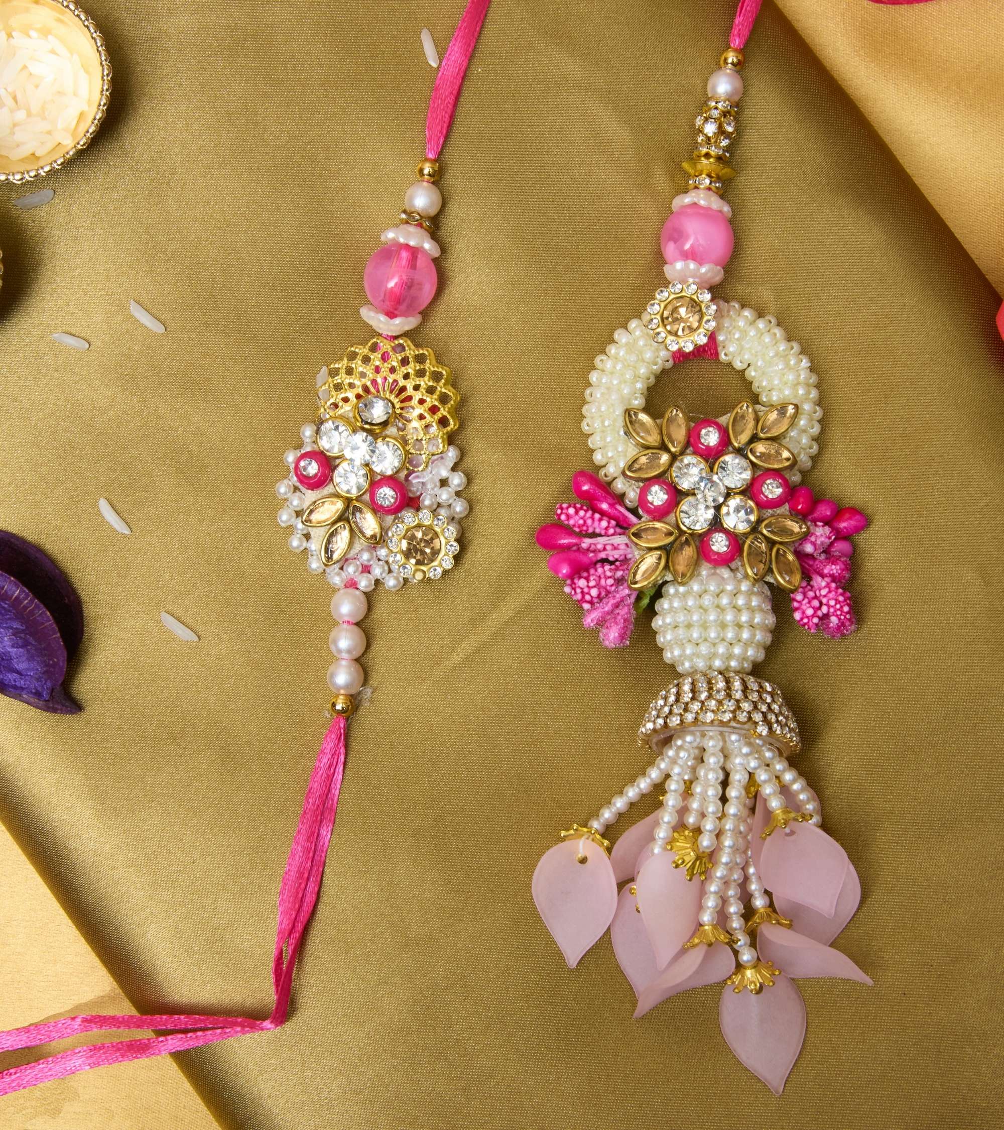 Premsons® Blush Bloom Rakhi–Lumba Set – Pink, Gold & White Floral Design with Beaded Tassels