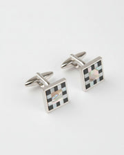 Square cufflinks with black checkerboard mother-of-pearl inlay and silver frames