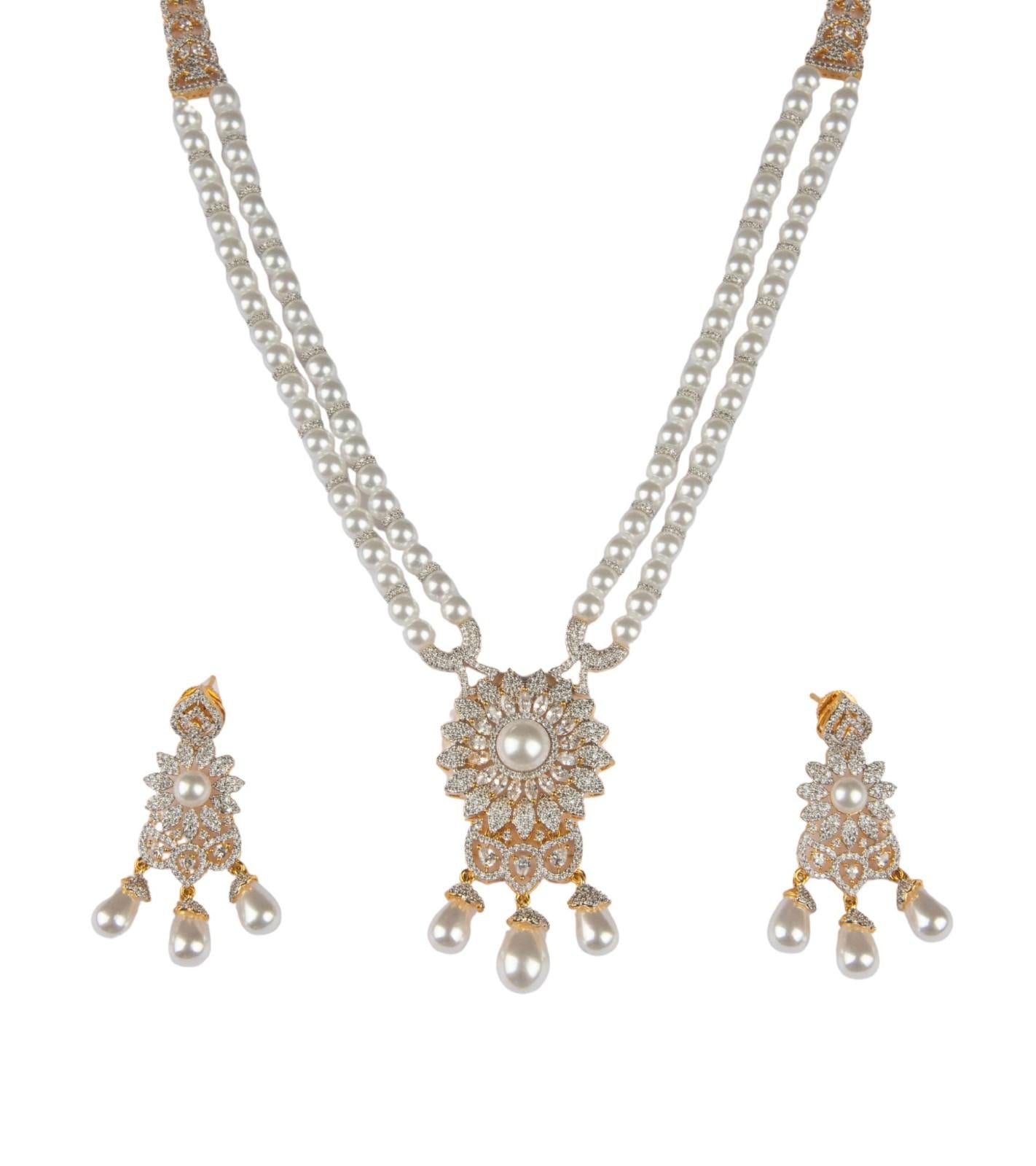 Double-strand pearl necklace with floral center pendant; matching dangling pearl earrings