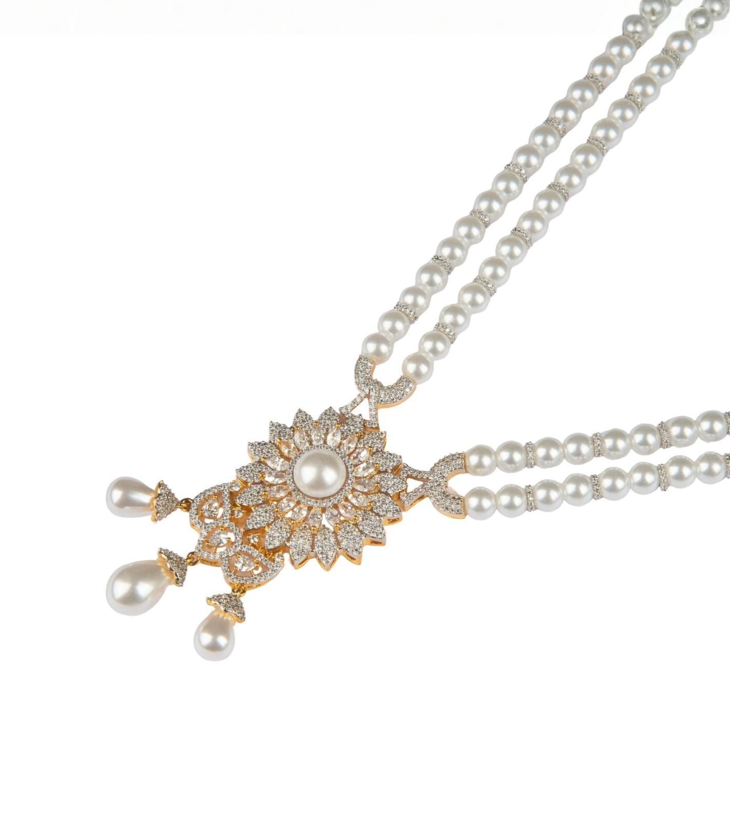 Double-strand pearl necklace with floral CZ pendant and pearl tassel drops, gold-tone