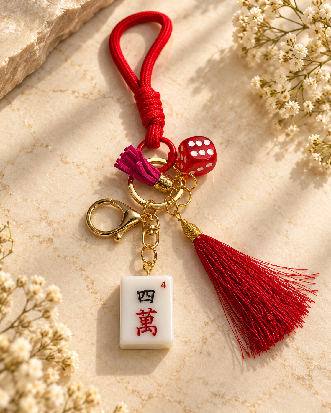 Mahjong tile keychain with gold rings, red cord, tassel and square tile charm