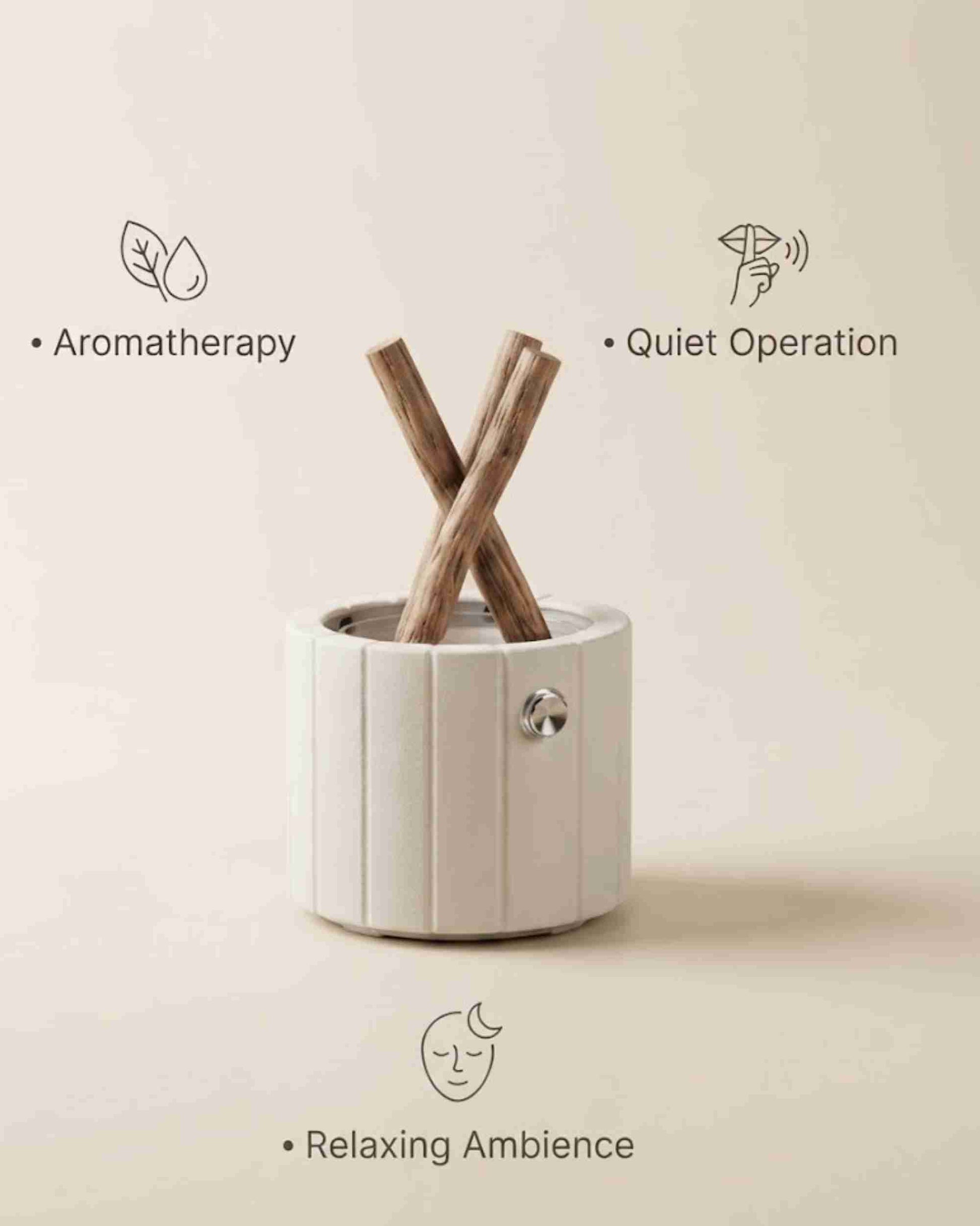 White ceramic aroma diffuser with stacked wooden logs and side control knob