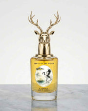 Eternia Tears of the Moon eau de parfum bottle with gold deer antler cap and amber