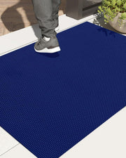 Blue anti-skid floor mat with textured diamond grid surface
