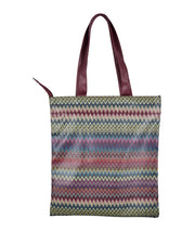 Zigzag print tote bag with maroon top handles, multicolor chevron pattern
