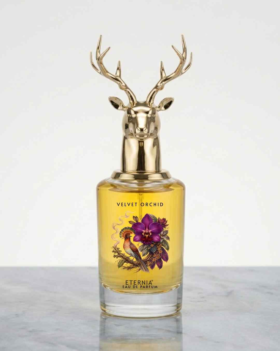 Eternia® Velvet Orchid eau de parfum bottle with gold deer-antler cap, amber liquid