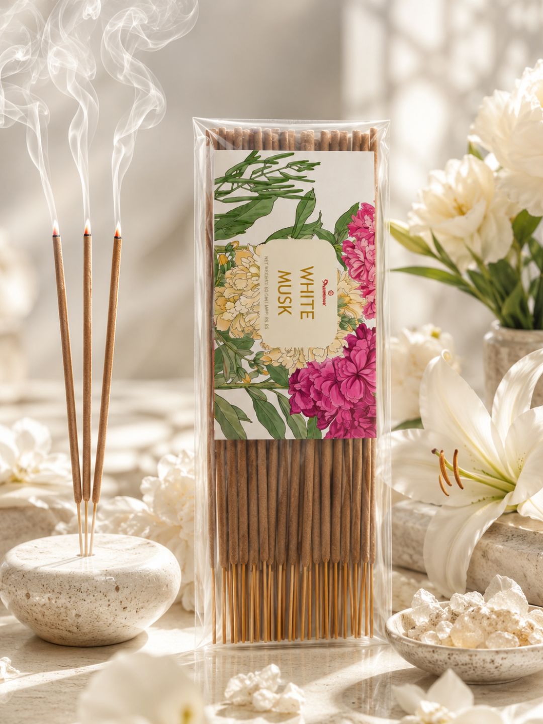 Incense sticks in floral boxed wrapper, brown sticks upright on a base