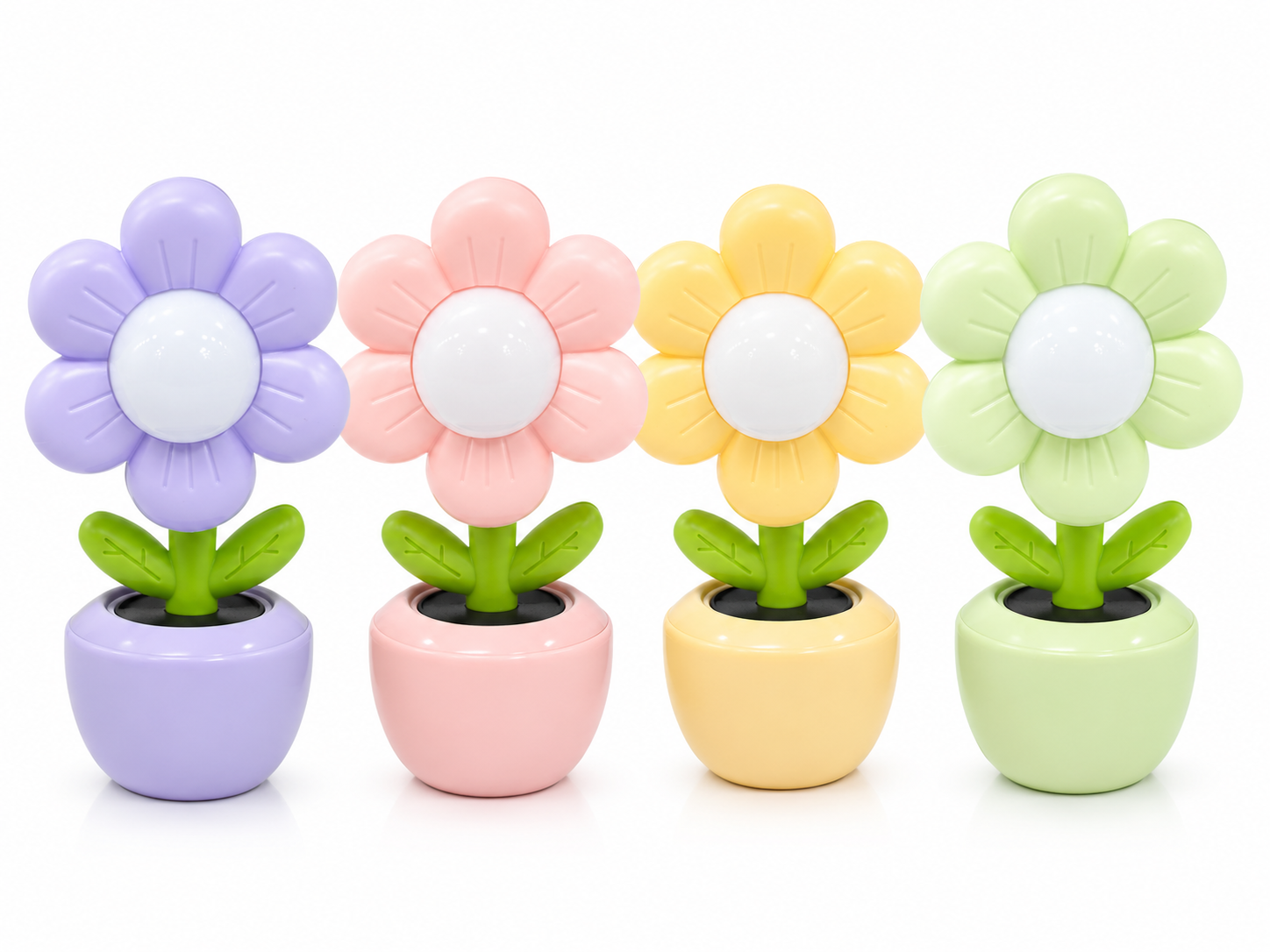 Set of four flower LED night lights in purple, pink, yellow, and green pots.
