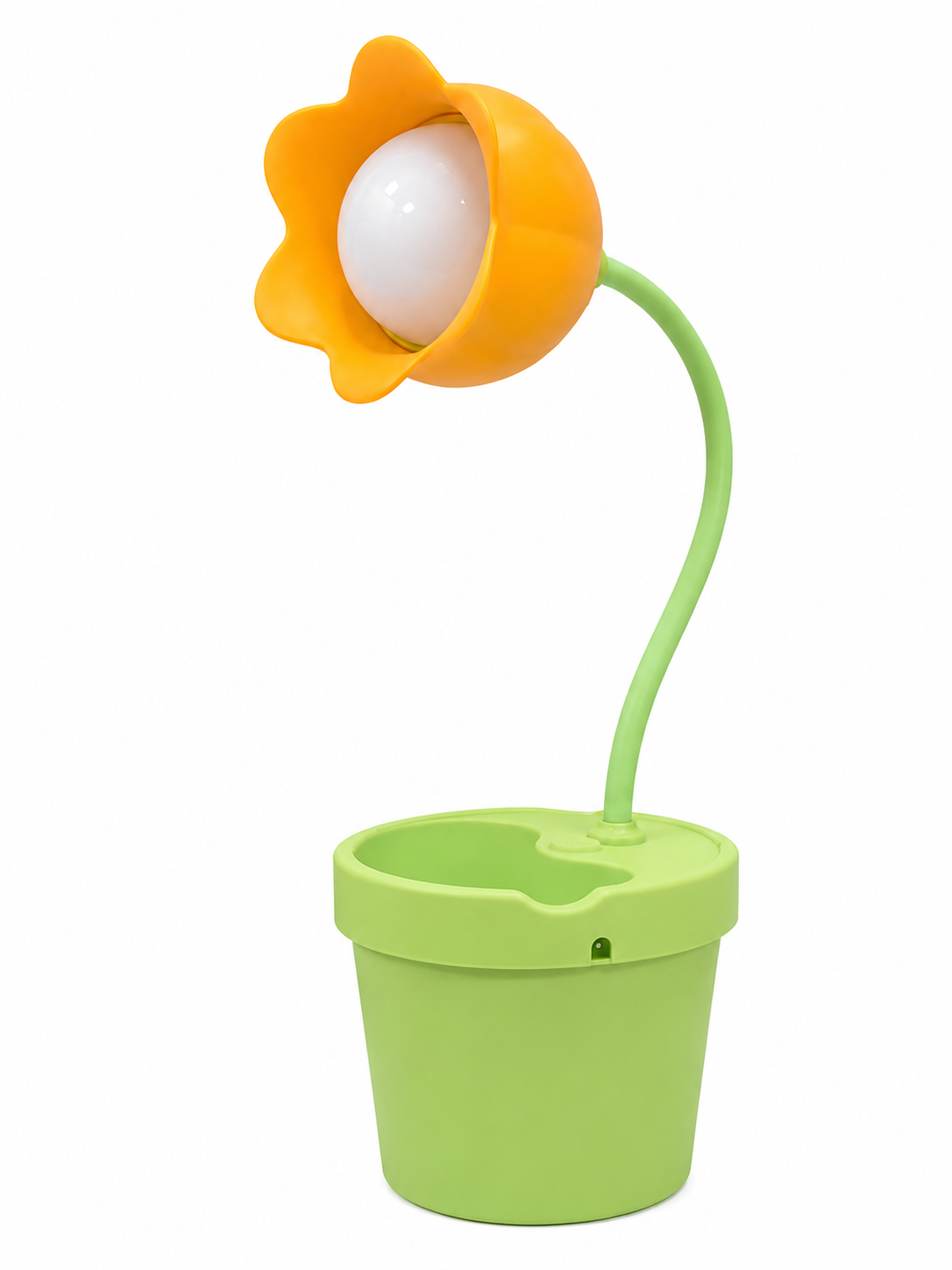 Orange flower LED desk lamp with white bulb and green stem on a green planter