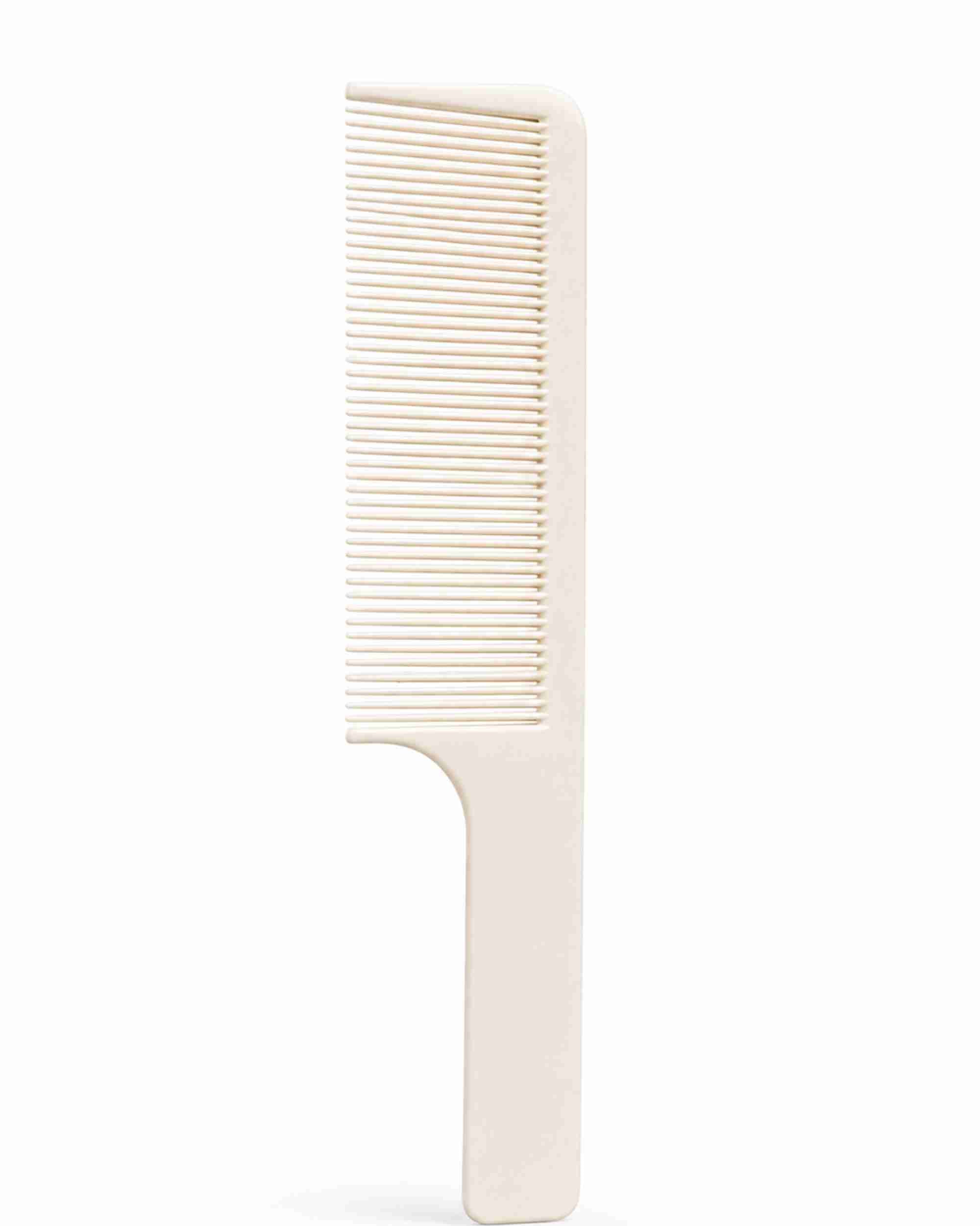 White fine-tooth handle comb with closely spaced teeth for smooth styling.