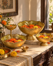 Gold-tone floral bowl set with scalloped rims, faceted interiors, and pedestal bases