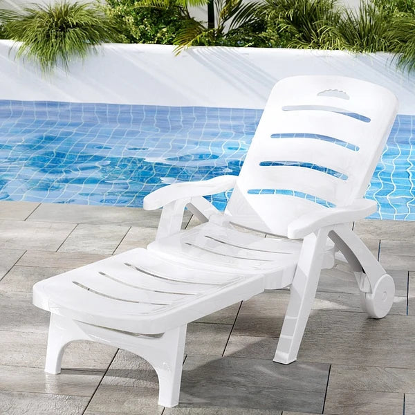 White adjustable foldable plastic chaise lounge with curved slat seat and back