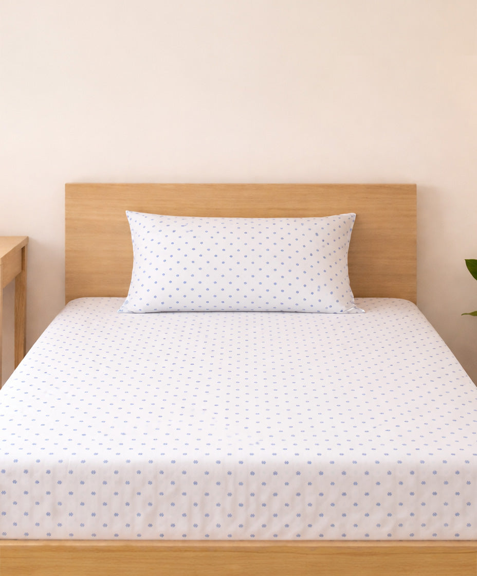 Queen size bedsheet set with blue mini flower print on white and matching pillow