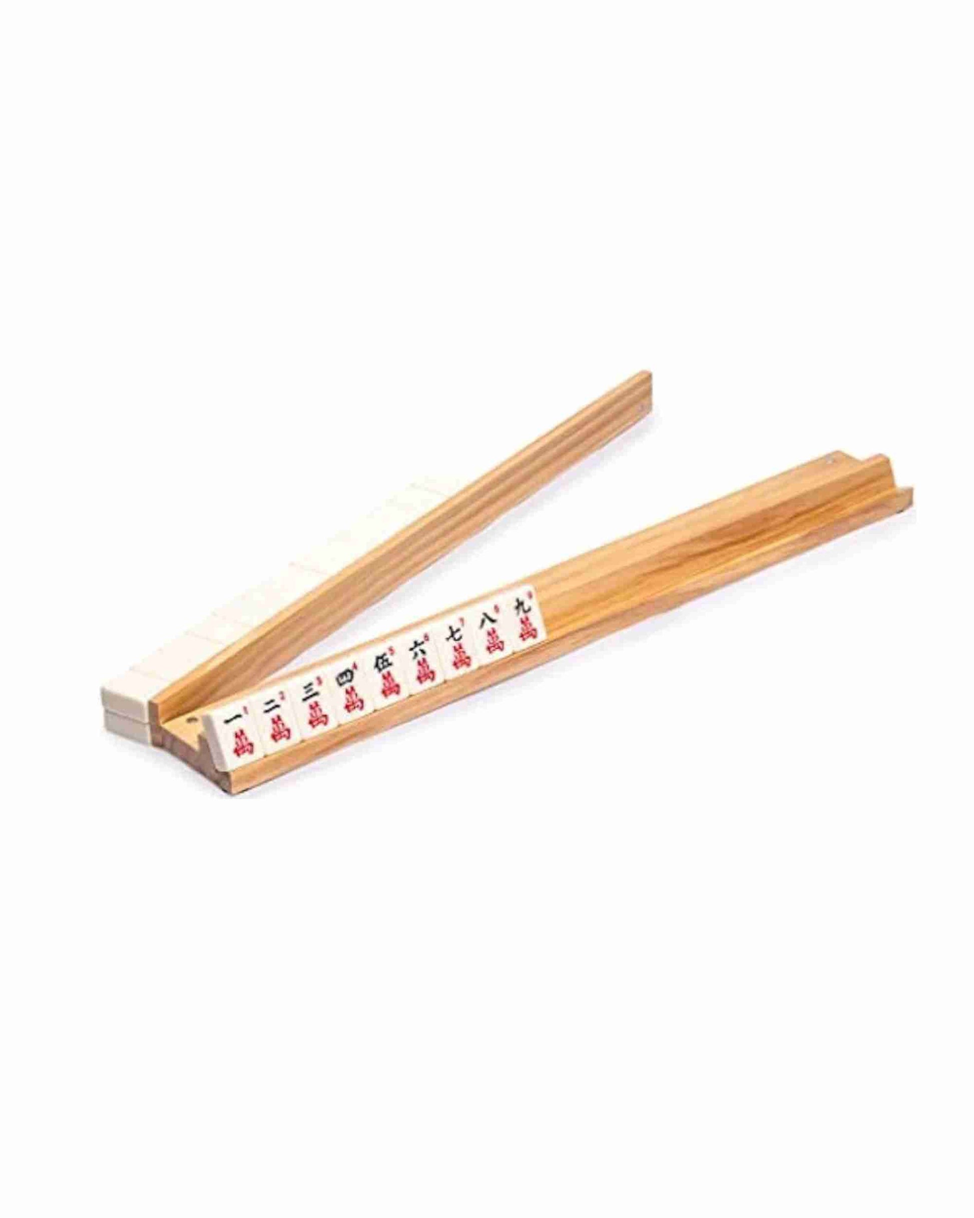 Wooden mahjong tile rack with a row of tiles, smooth light wood frame